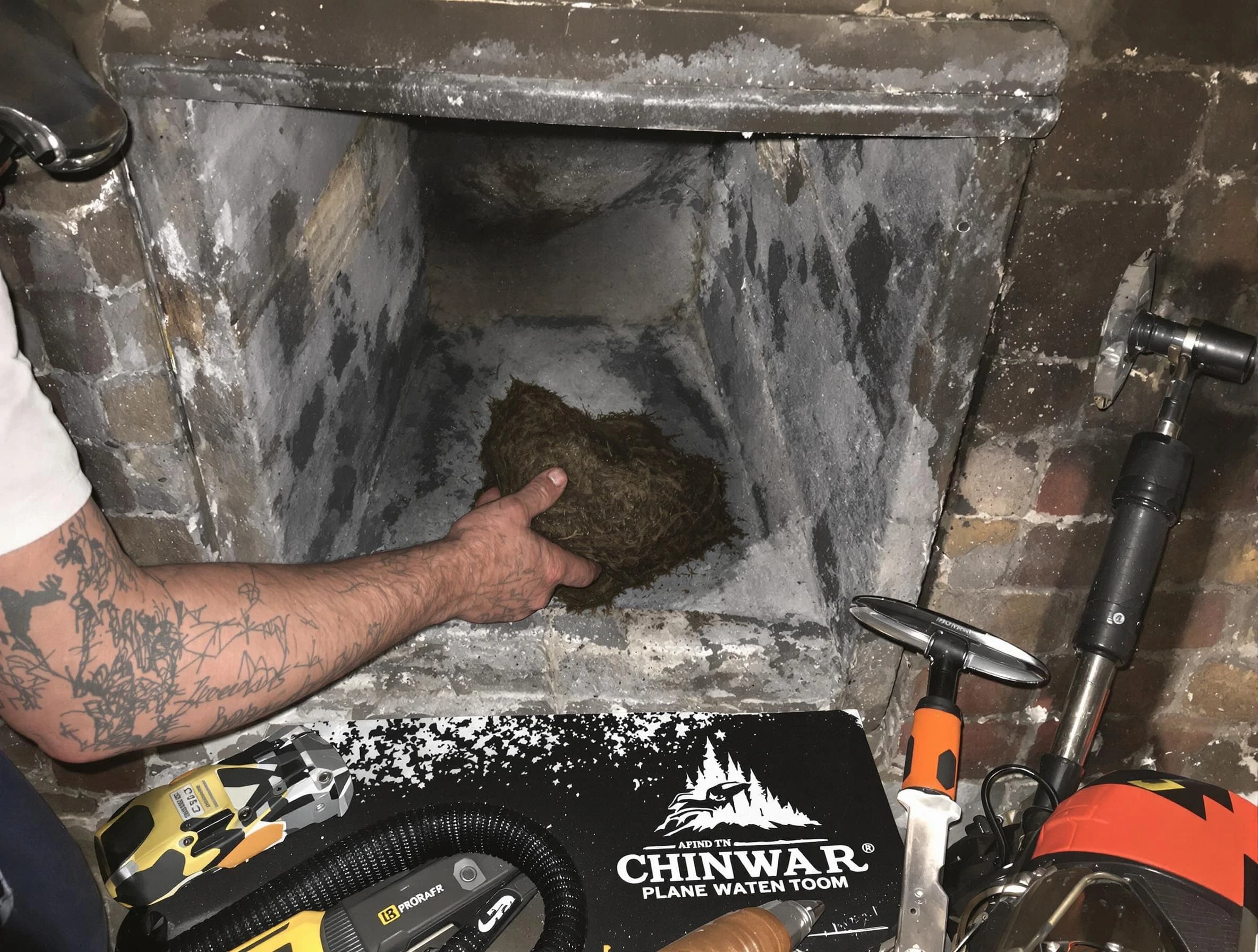 Lafayette Chimney Sweep safely removing debris and screening chimney in Lafayette, TN